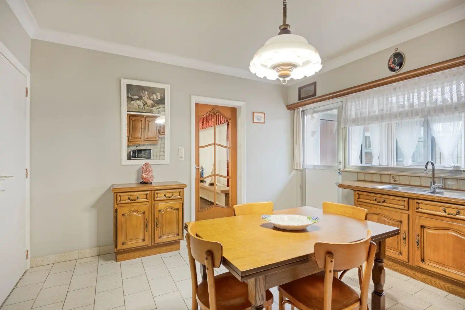 Ruim ingedeelde gelijkvloers woning op een mooi breed perceel van 812 m². foto 12
