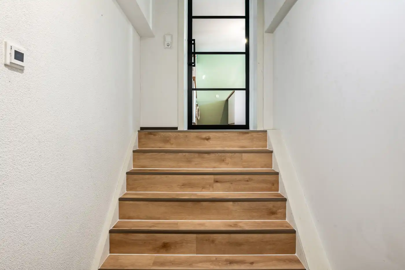 Instapklaar app. op 1ste verd. met 2 slpk. en autostaanplaats foto 17