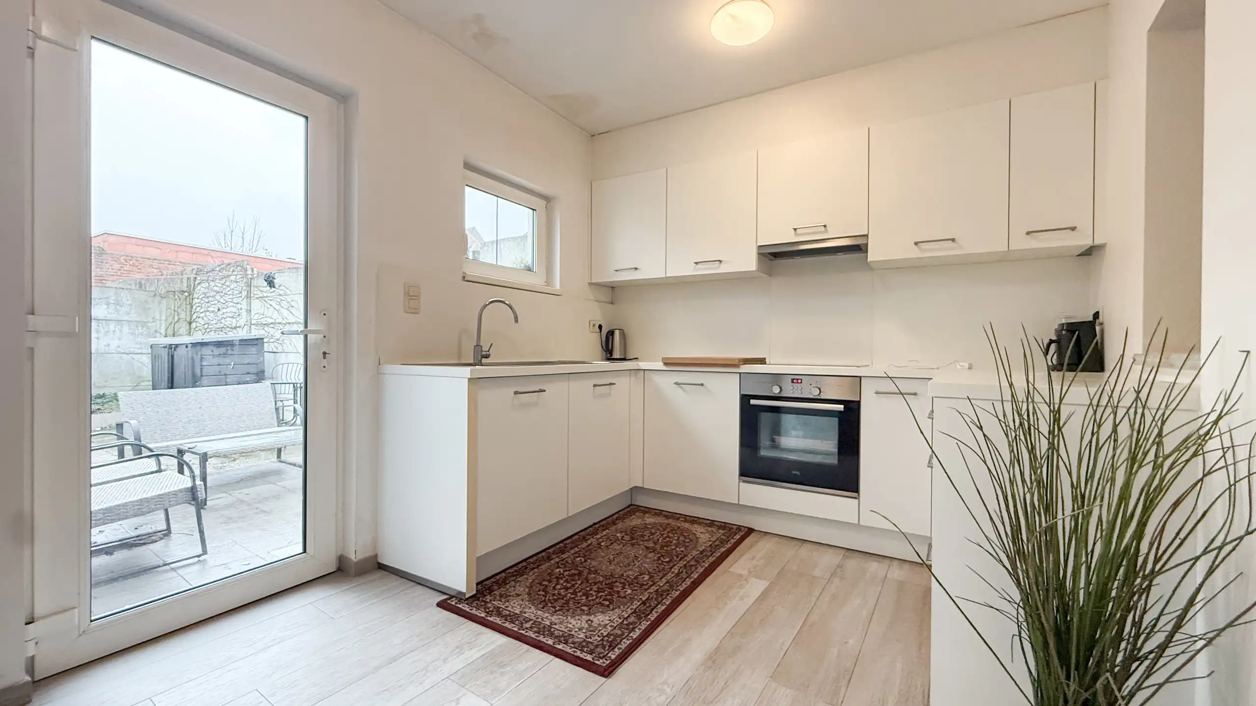 Instapklaar gelijkvloers appartement in Heusden! foto 11