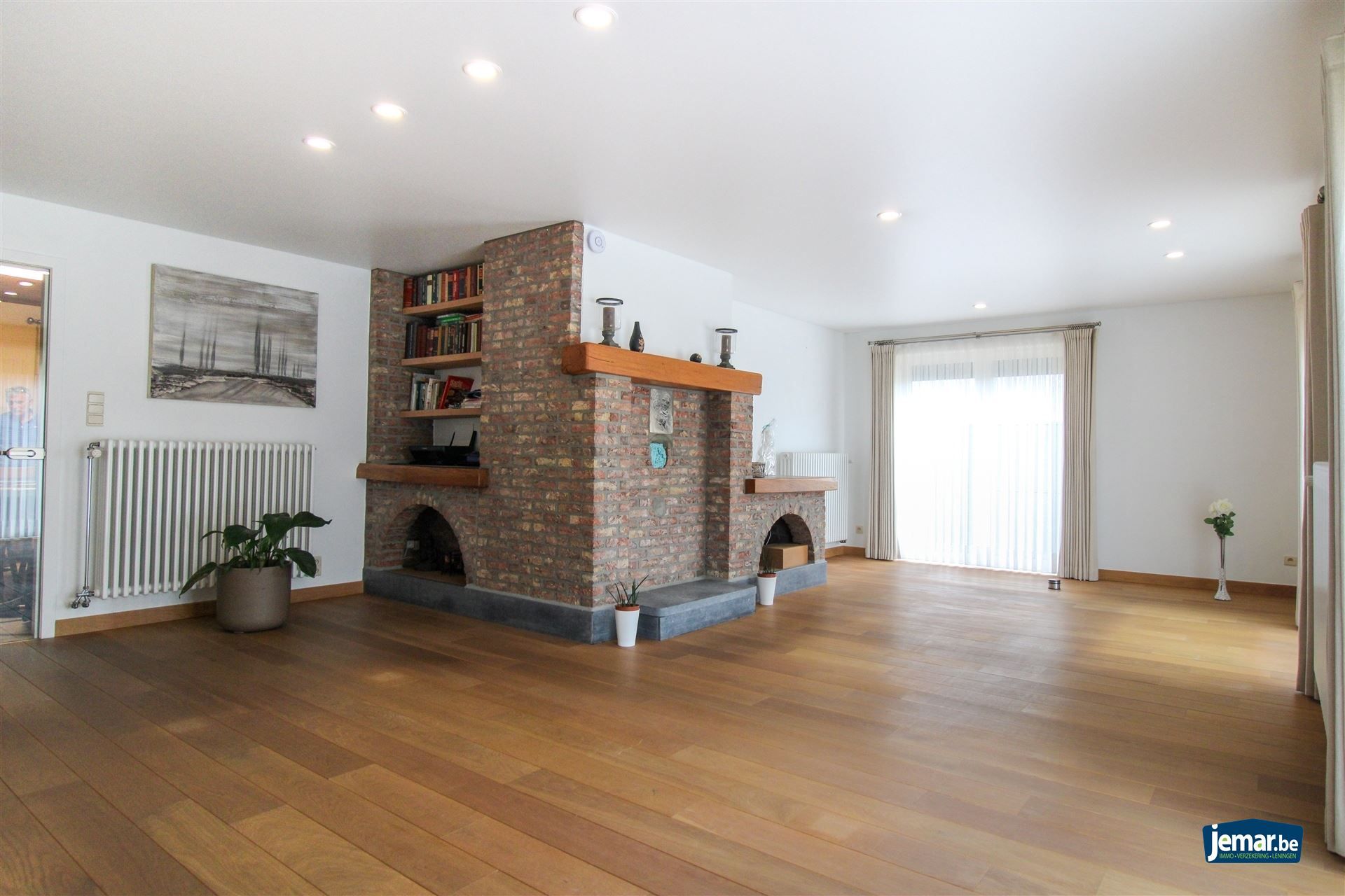 Instapklare en perfect onderhouden woning met 3 slaapkamers, 2 badkamers en een prachtige tuin van 6a74ca  in hartje Maasmechelen! foto 4