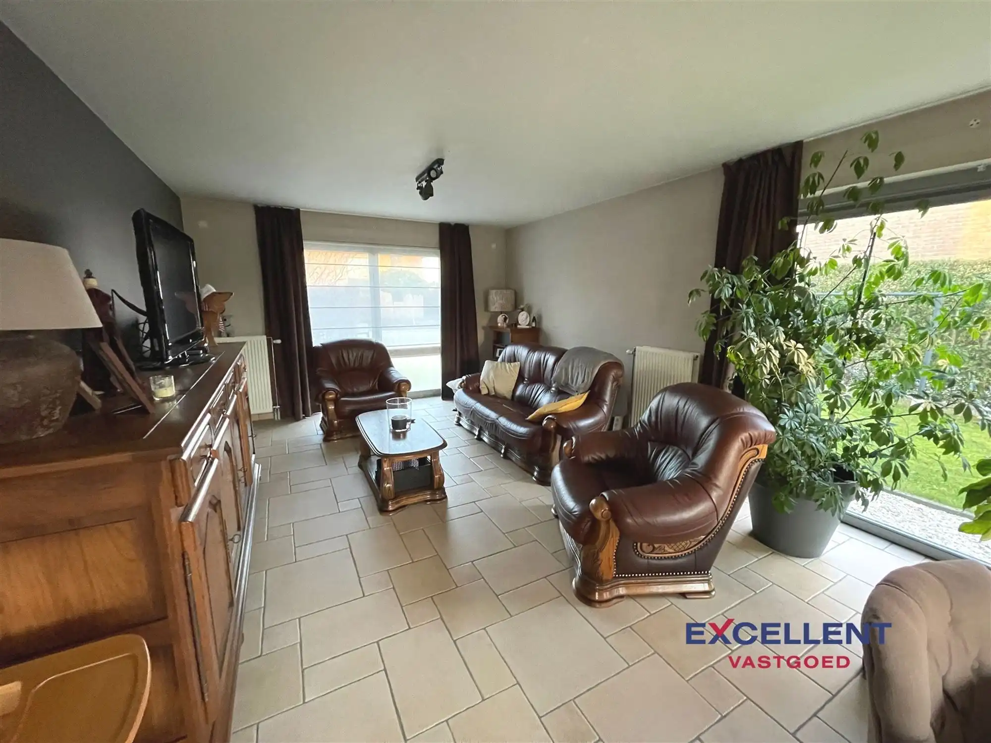 Rustig gelegen halfopen woning te huur in Deinze foto 4