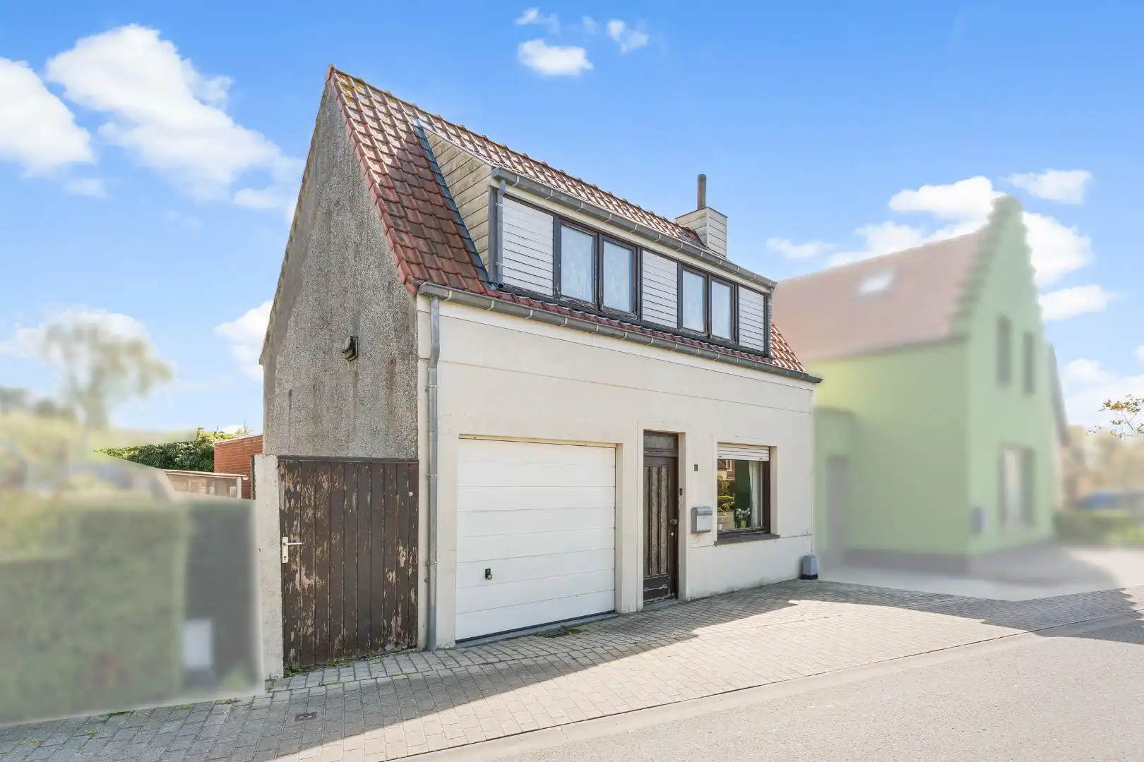Hoofdfoto van de publicatie: Charmante woning met tuin en garage te Dudzele
