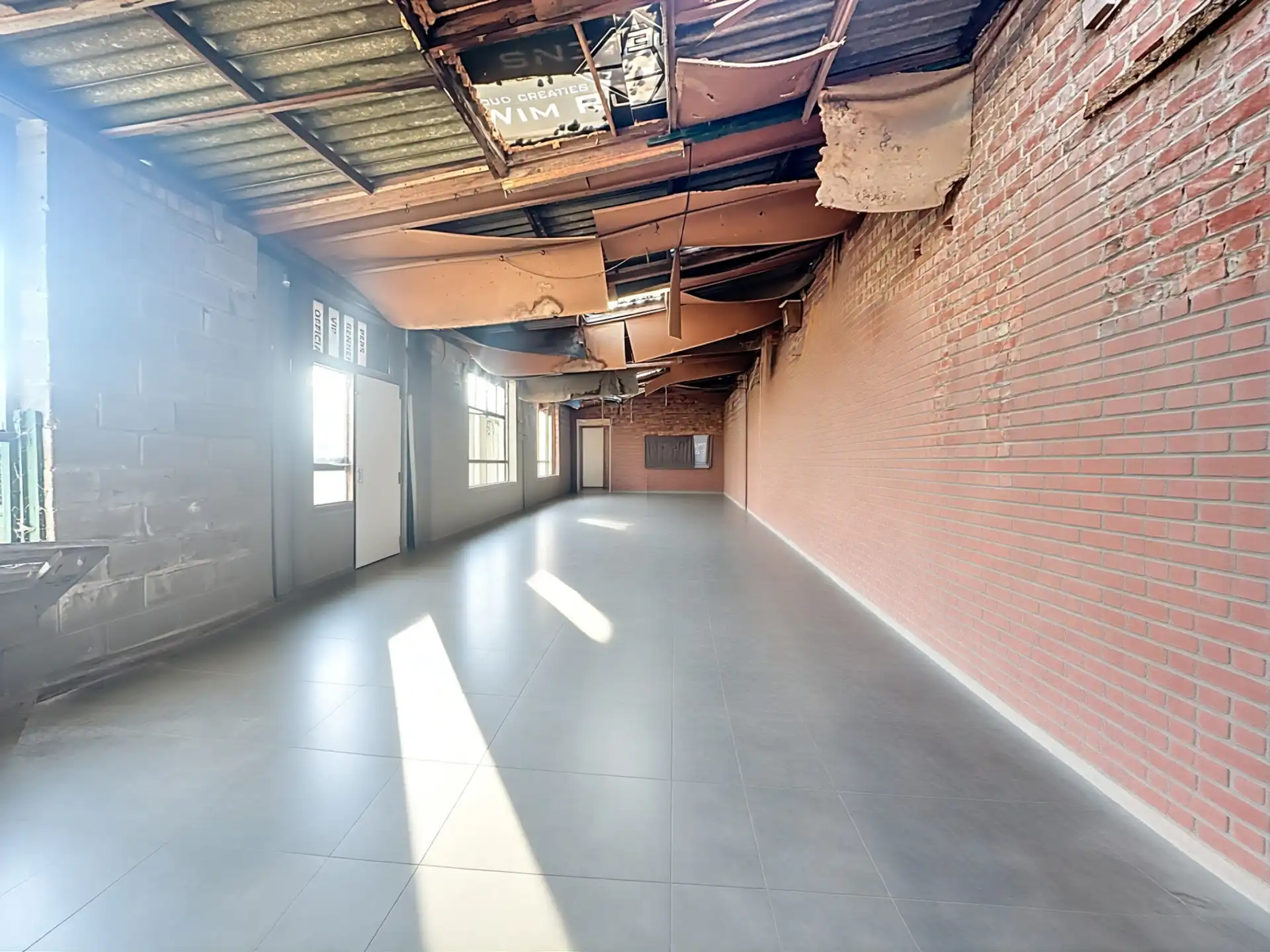 Renovatieproject met potentieel: driegevelwoning met atelier, tuin en parking in hartje Wezembeek-Oppem. foto 18