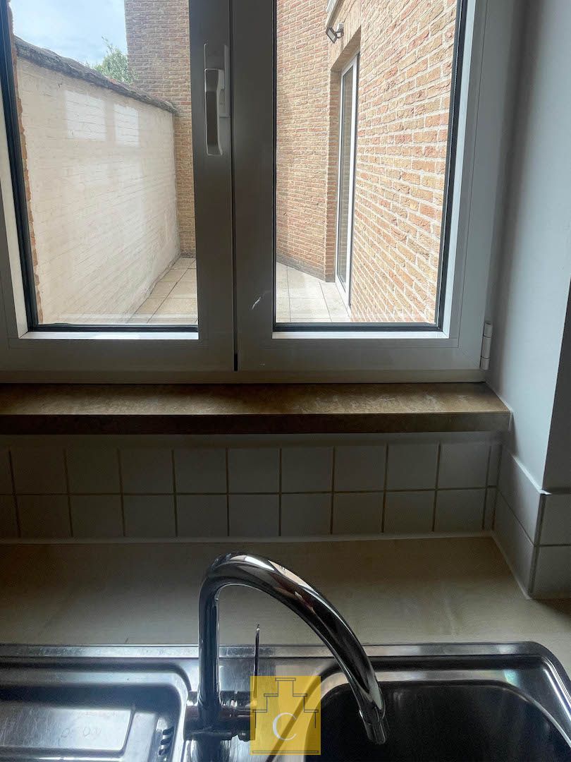 Instapklaar appartement met ruime terrassen en fietsenberging in hartje Brugge foto 12