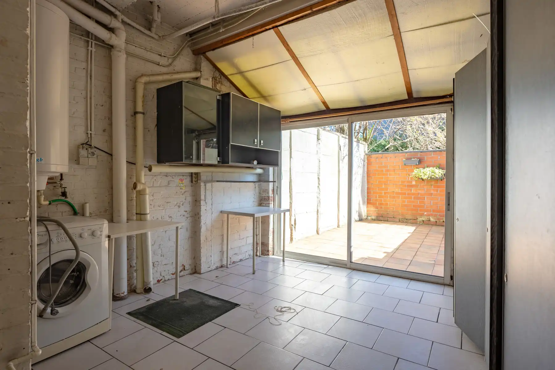 Te renoveren woning in het centrum met garage en terras! foto 10