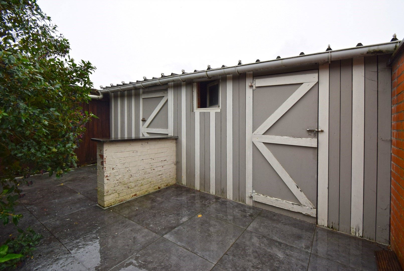 KARAKTERVOLLE WONING MET STADSTUIN foto 14