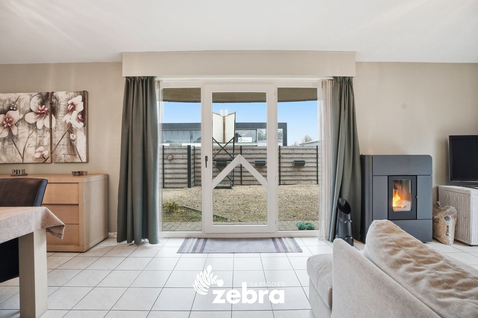 Instapklaar gelijkvloers appartement met tuin van 116 m² en garage! foto {{pictureIndex}}