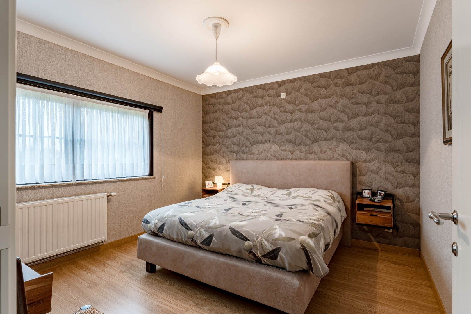 Ruim, goed afgewerkt gelijkvloers landhuis op een perceel van 13a20ca  nabij het centrum van Neeroeteren!  foto 22