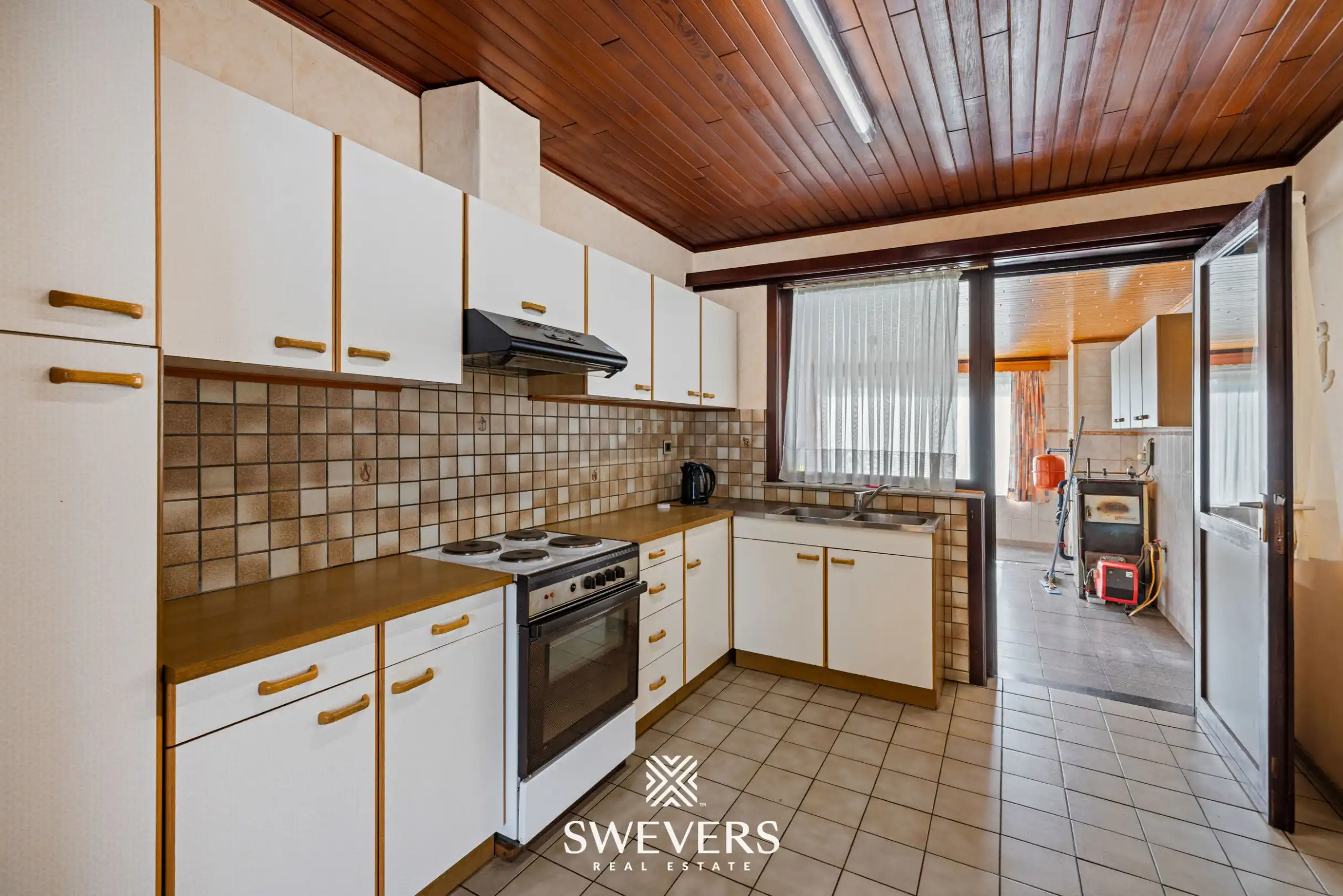 Gelijkvloerse woning met 3 slaapkamers op 10a 85ca foto 8