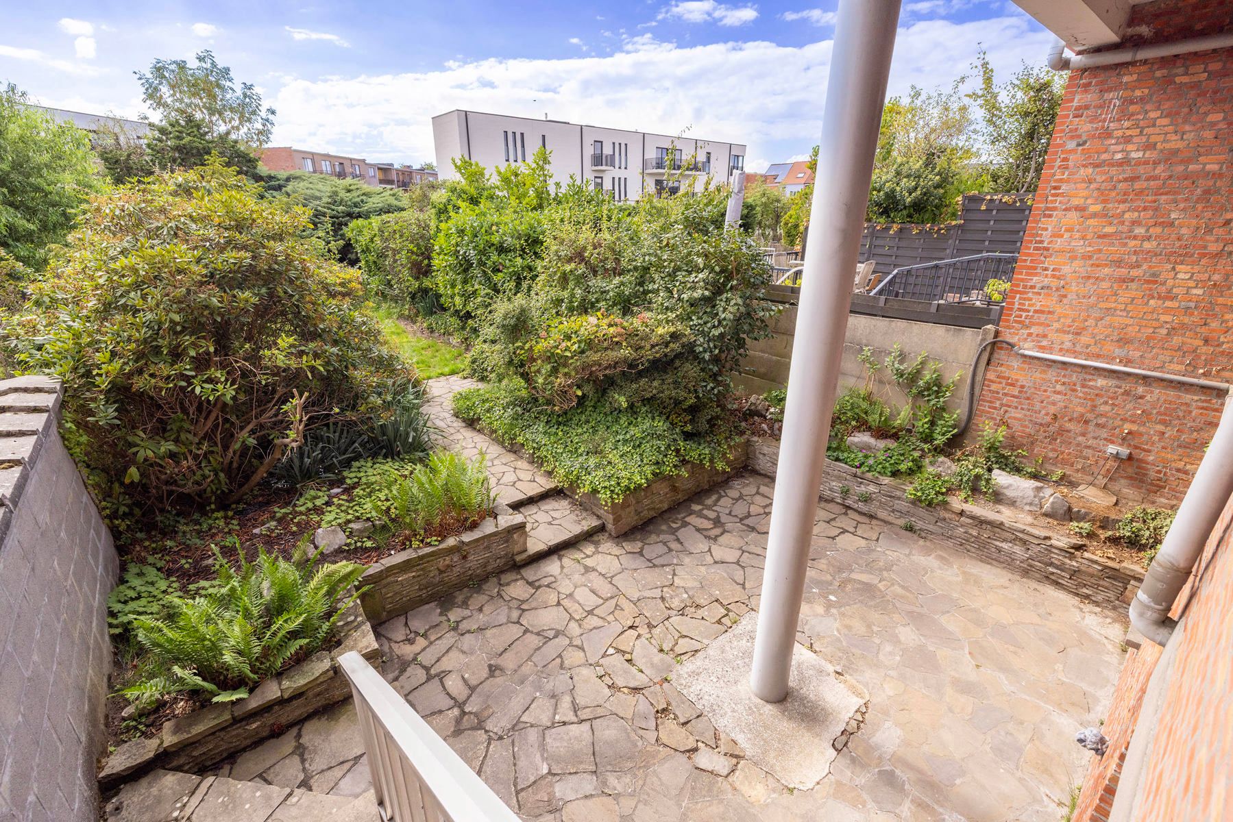 Gelijkvloers appartement met grote stadstuin foto 19