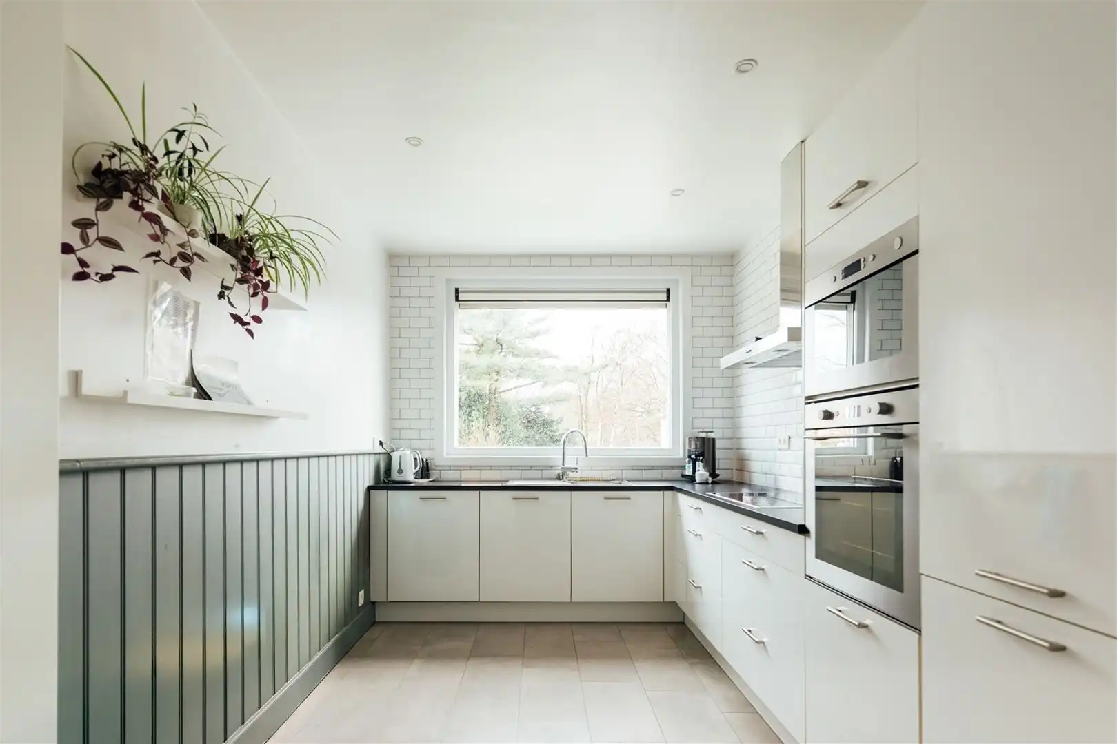 Opbrengsteigendom met praktijk en duplex appartement foto 23