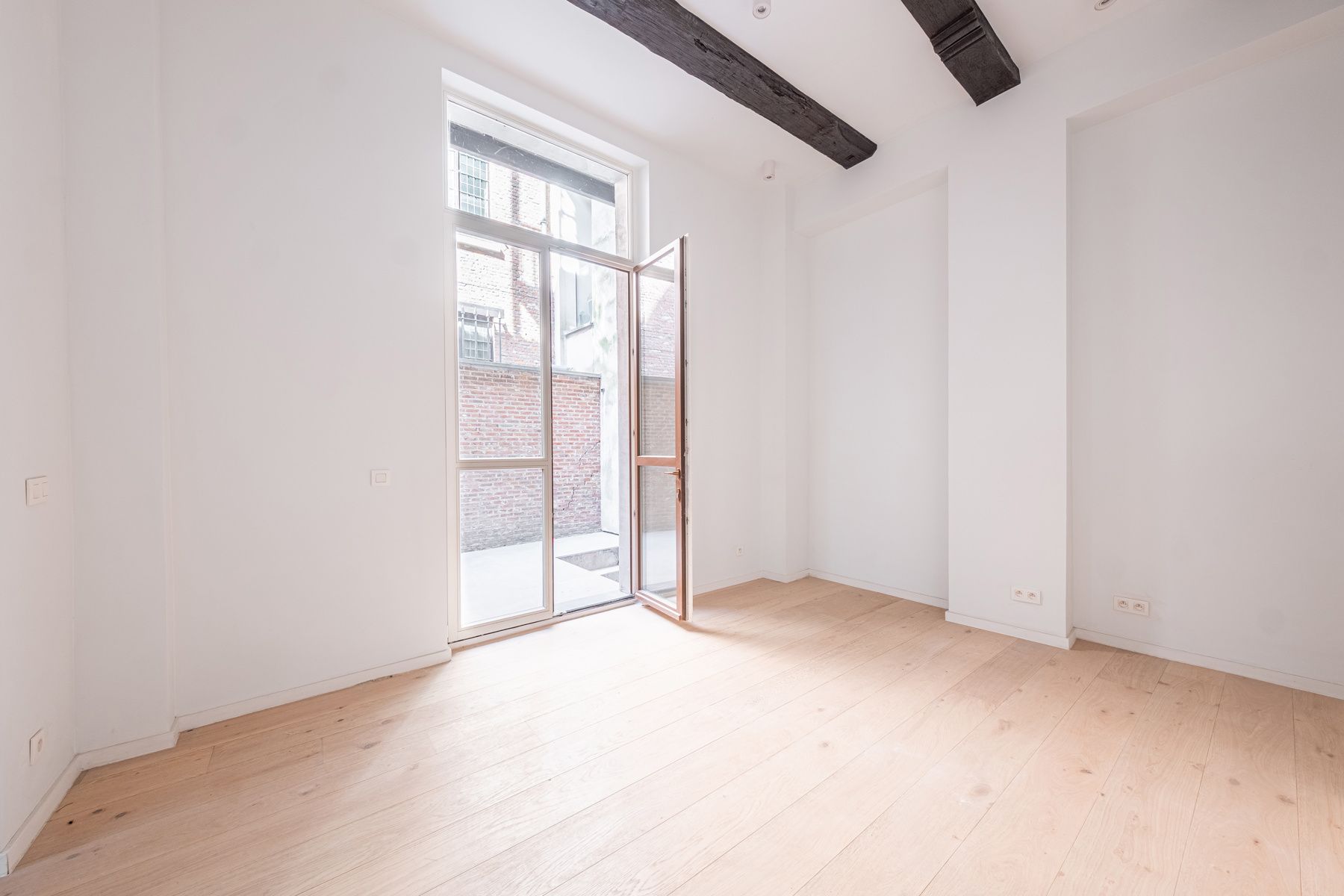 Gelijkvloers appartement met stadskoer in hartje Antwerpen foto 4