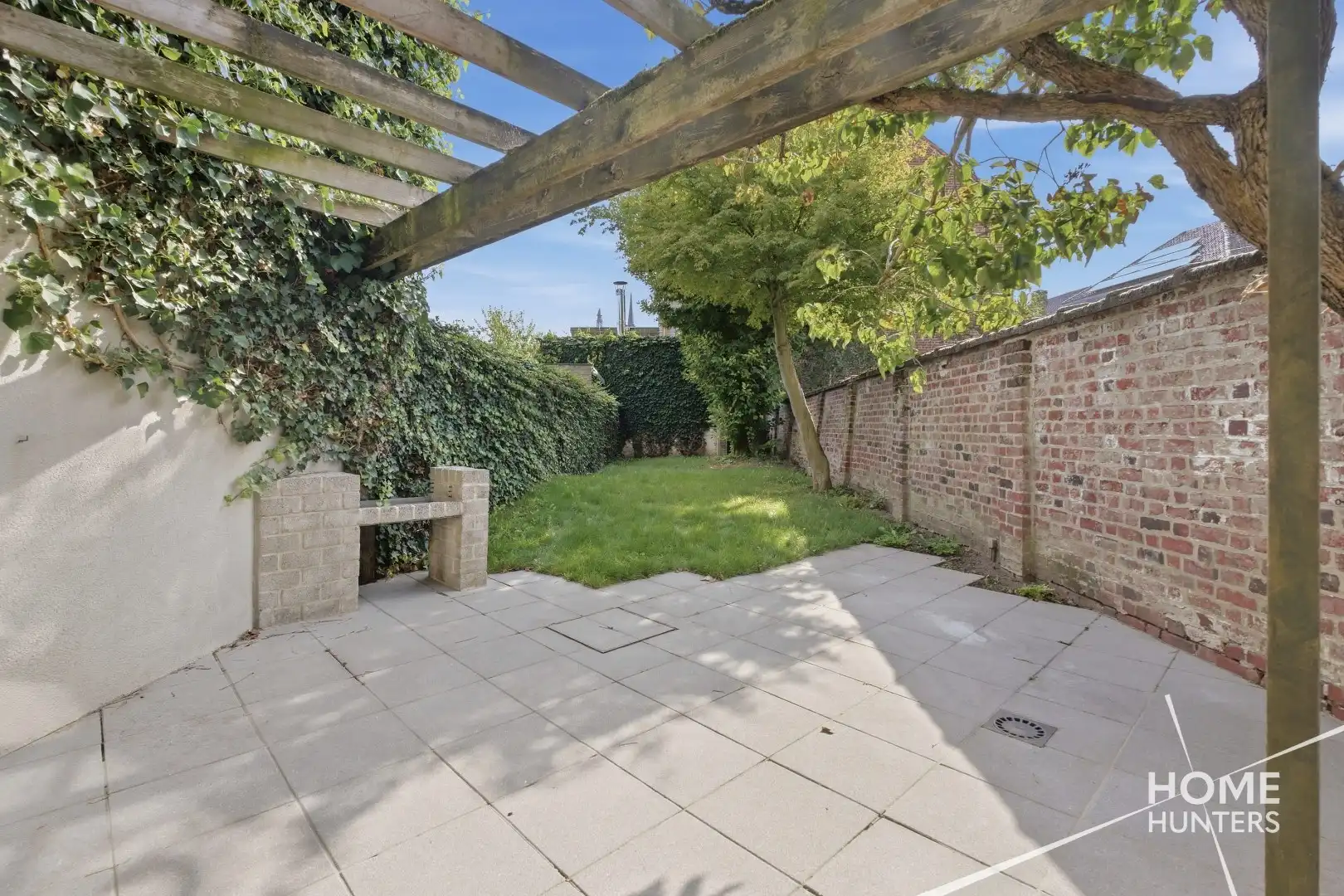 Ruime instapklare stadswoning met 3 slpks, tuin en EPC B foto 13
