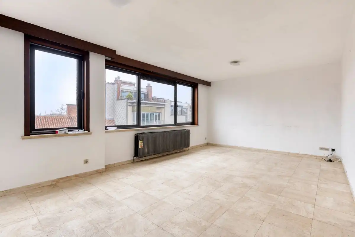 Functioneel en zonnig te renoveren appartement met drie slaapkamers en groot terras foto 4