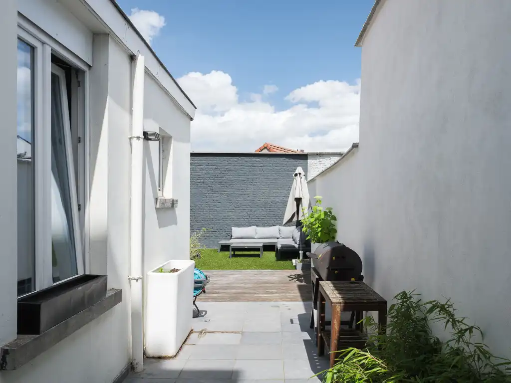 Karaktervolle burgerwoning met 4 slaapkamers en aangename stadstuin op een boogscheut van het stadscentrum. foto 5