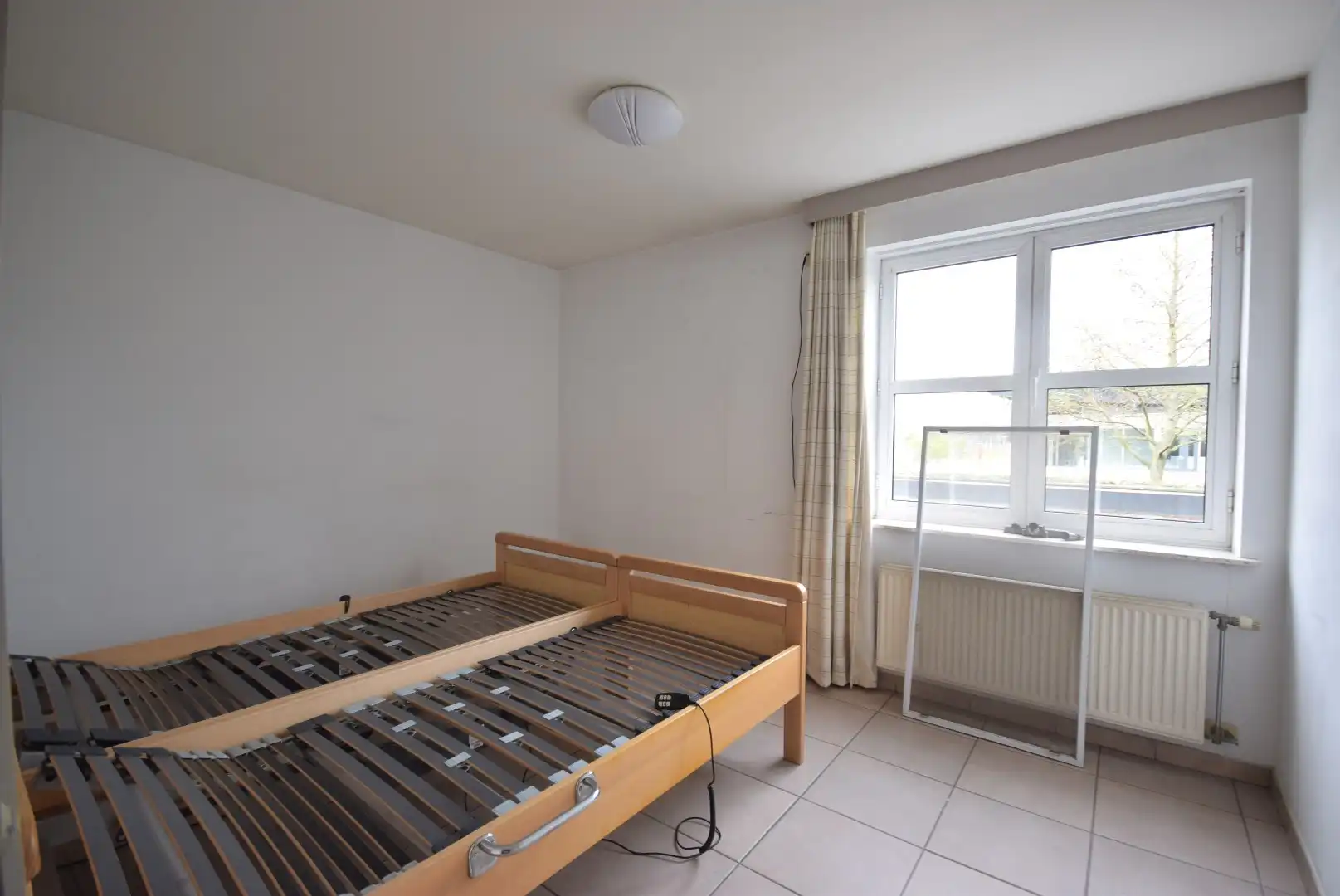 Ruim appartement met 2 slaapkamers en terras in residentie Helminge foto 7