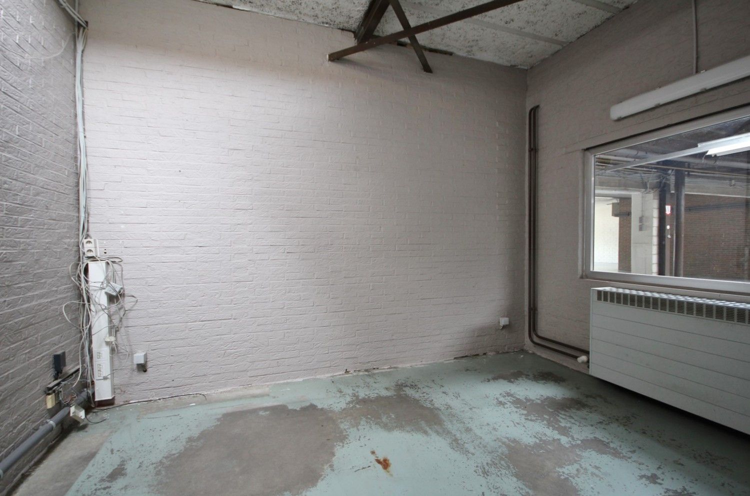 Ruim handelspand met magazijn op toplocatie foto 17