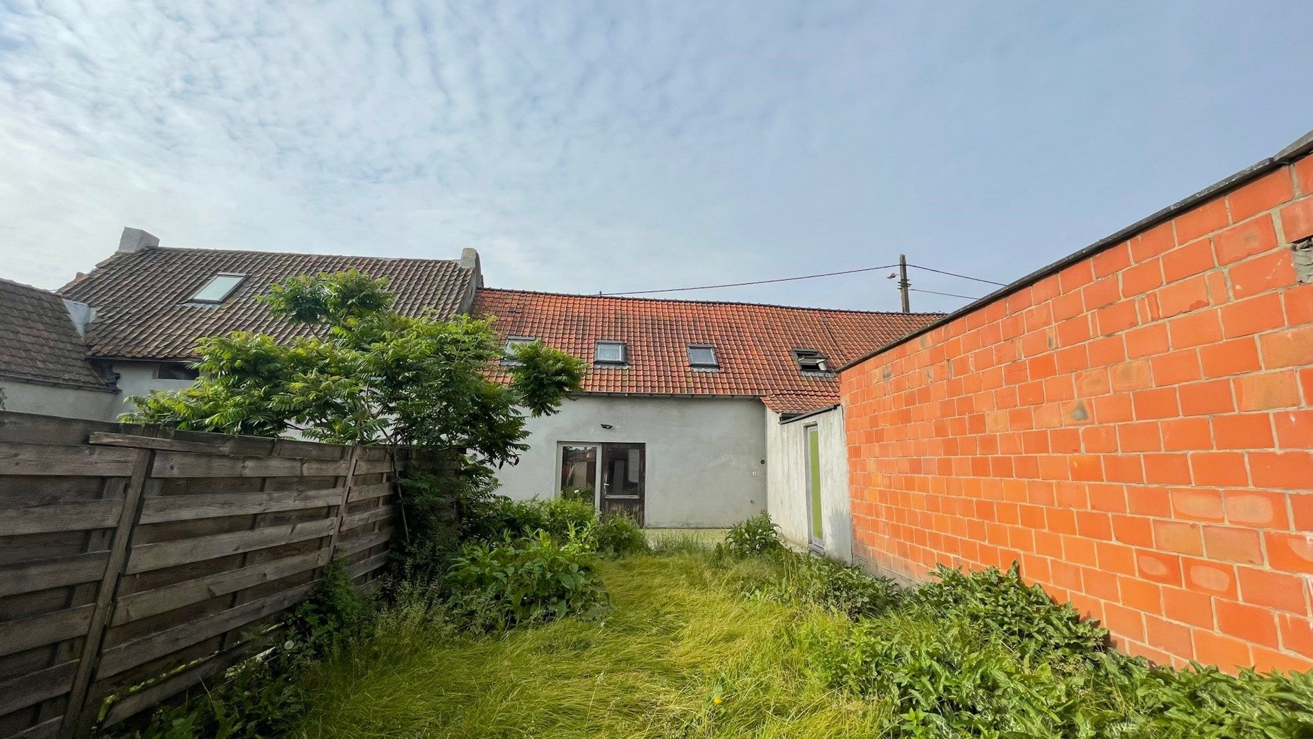 Grote woning met 2 kamers en zonnige tuin foto 3