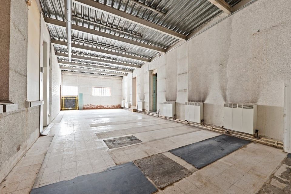 ICONISCH HANDELSPAND MET LUXUEUZE WOONST OP DE GROTE MARKT VAN SINT-TRUIDEN foto 39