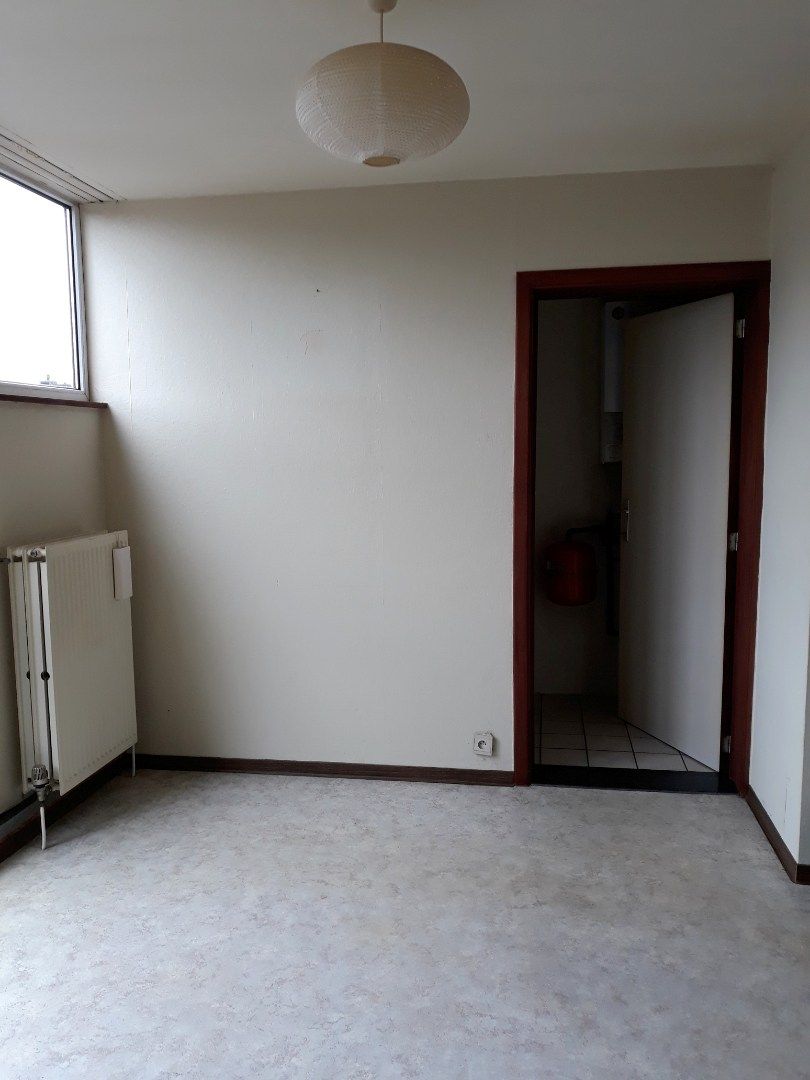 Ruim en licht dakappartement in Hasselt foto 4