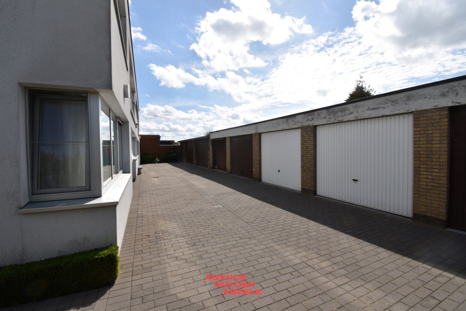 Opbrengsteigendom met 6 appartementen en 7 garages  foto 26