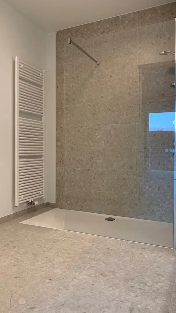 Nieuwbouw appartement + parking en berging te huur foto 7
