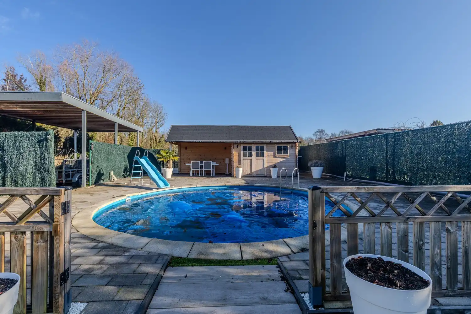 Stijlvolle, instapklare woning met vier slaapkamers, twee badkamers en verwarmd zwembad te koop in Lanaken foto 55