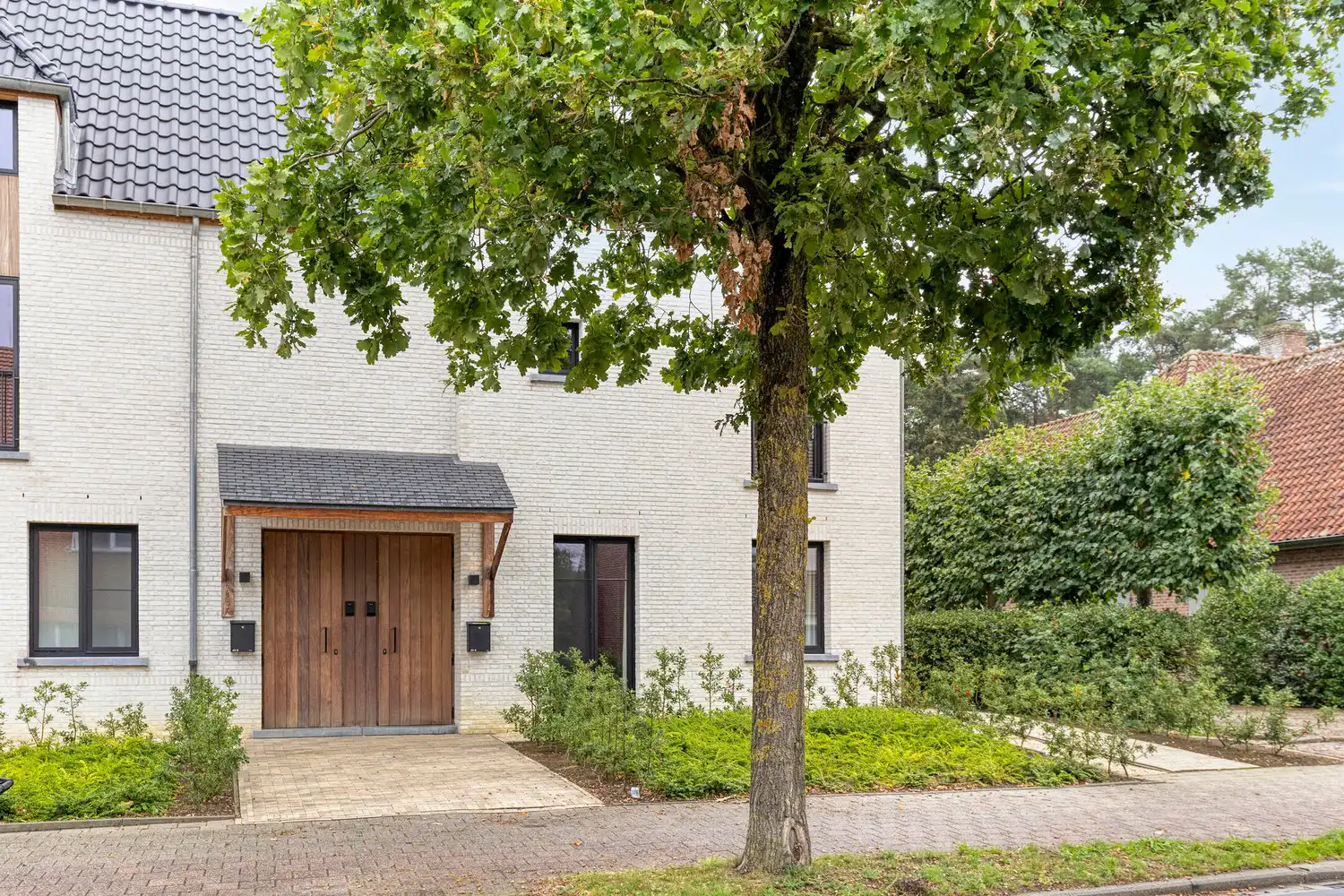LUXUEUS APPARTEMENT MET PRIVE TUIN, TERRAS EN GARAGE VOOR 2 WAGENS TE OLMEN! foto 28