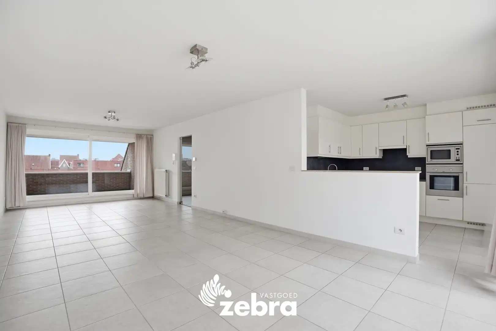 Duplex-appartement met 3 slpk, 3 terrassen + 2 badk in Roeselare! foto 4