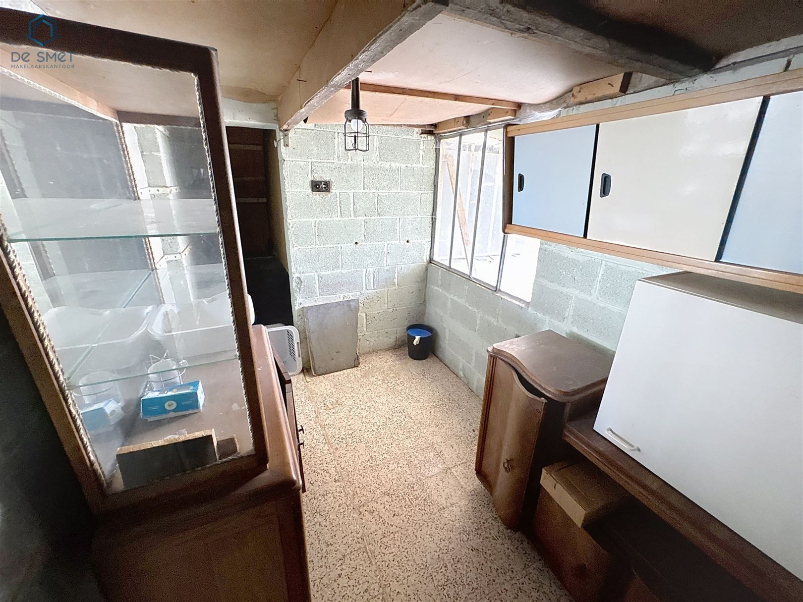 Veelzijdige Te Renoveren Woning met Handelsruimte in het Hart van Schendelbeke foto 10