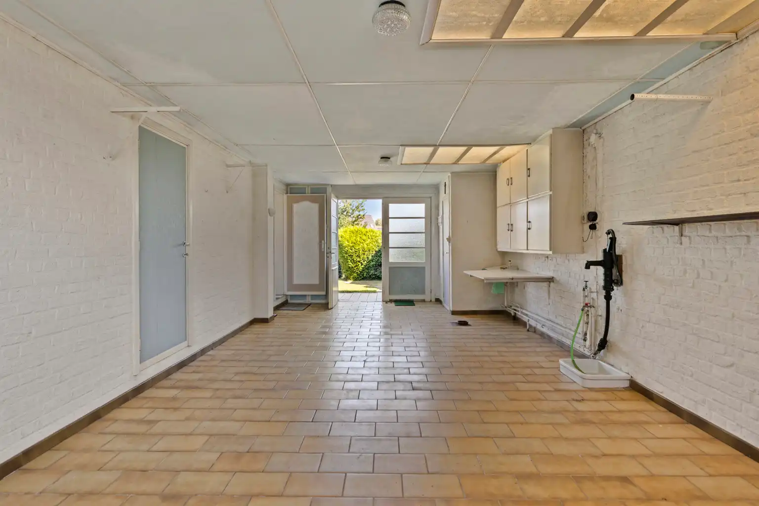 WONING MET TUIN IN DOODLOPENDE STRAAT foto 13