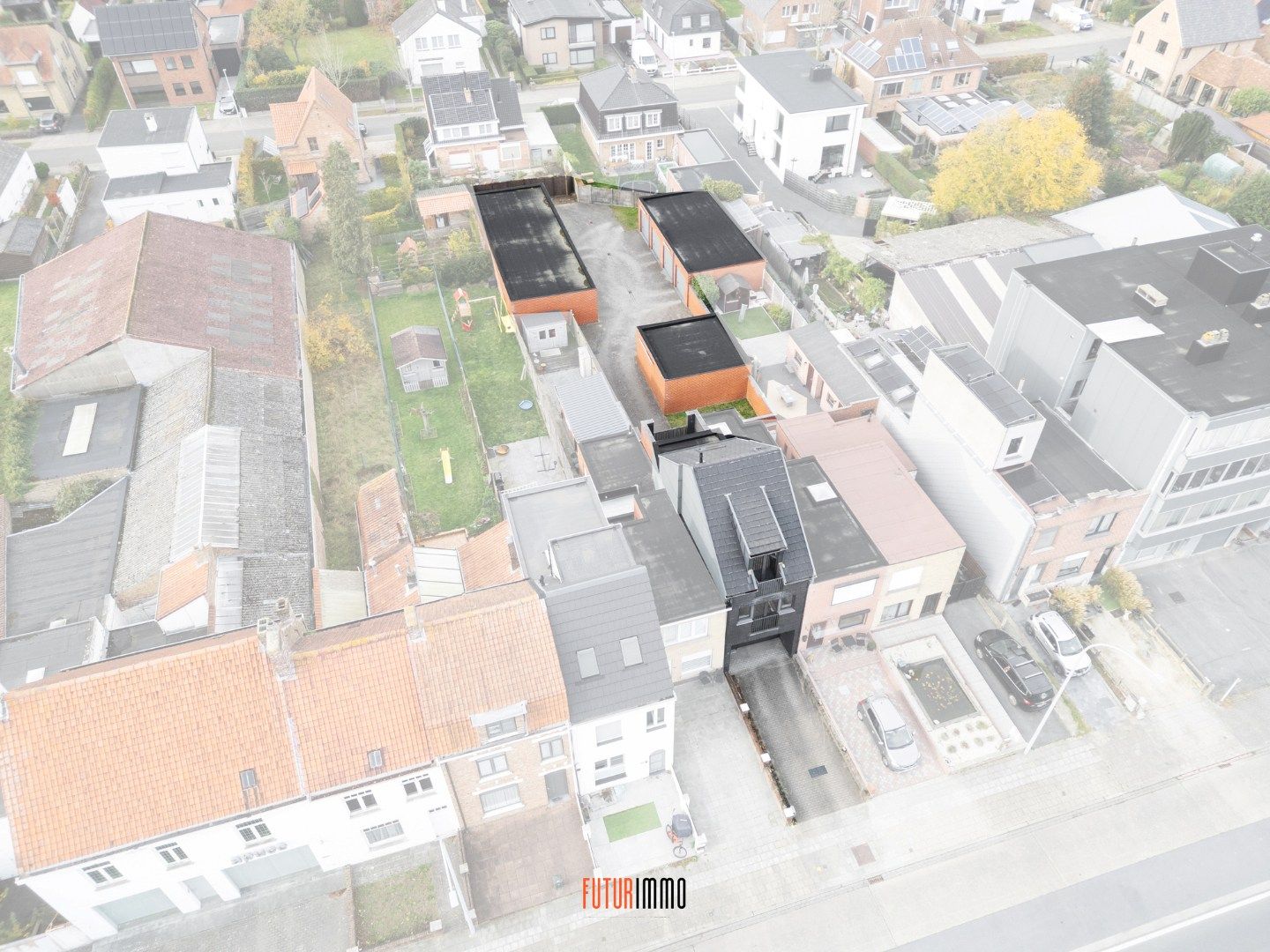 Opbrengsteigendom: duplexappartement + 12 garages foto 2