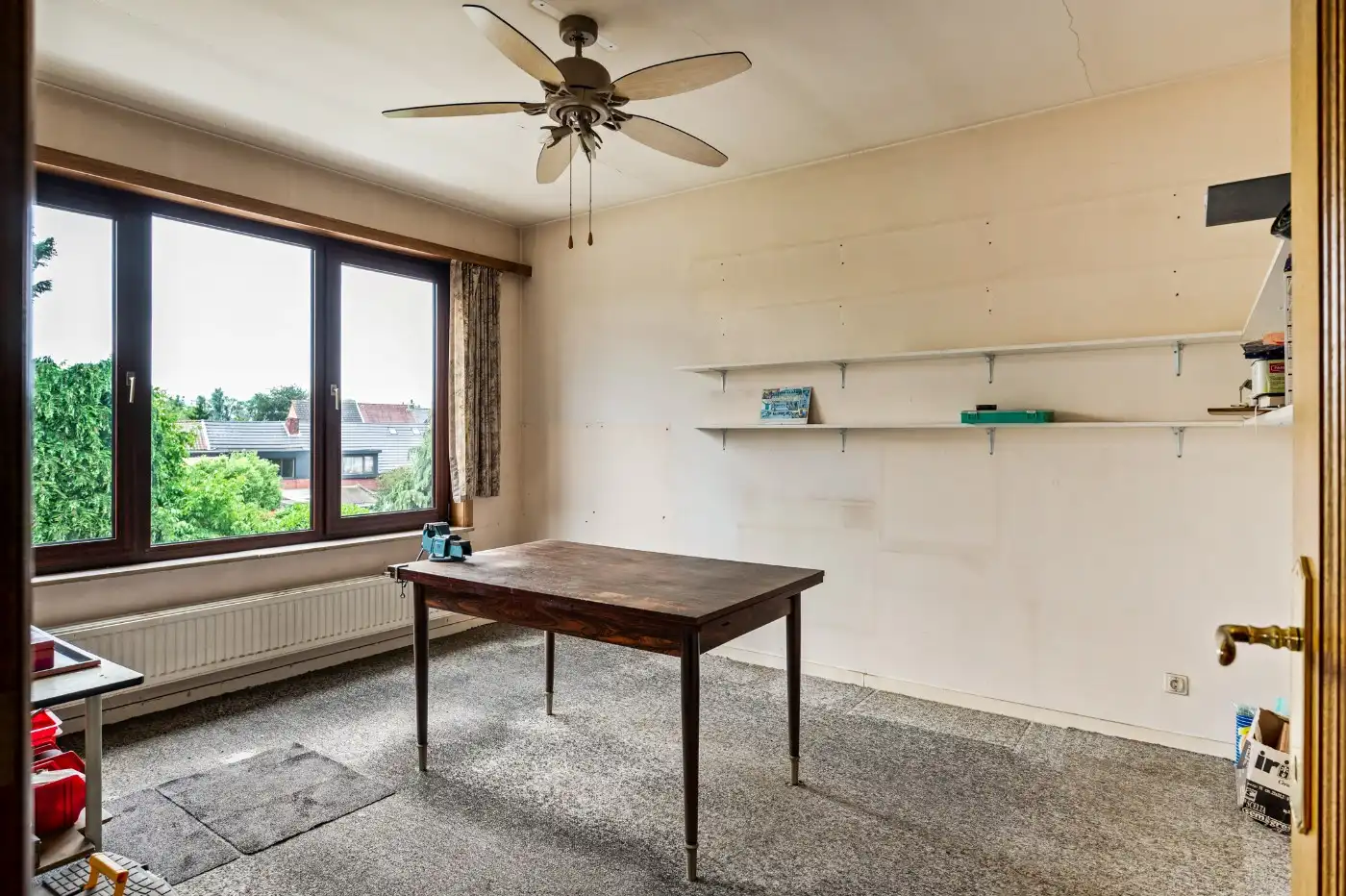 Centraal gelegen beletage-woning met 3 slpk., inpandige garage en tuin foto 11