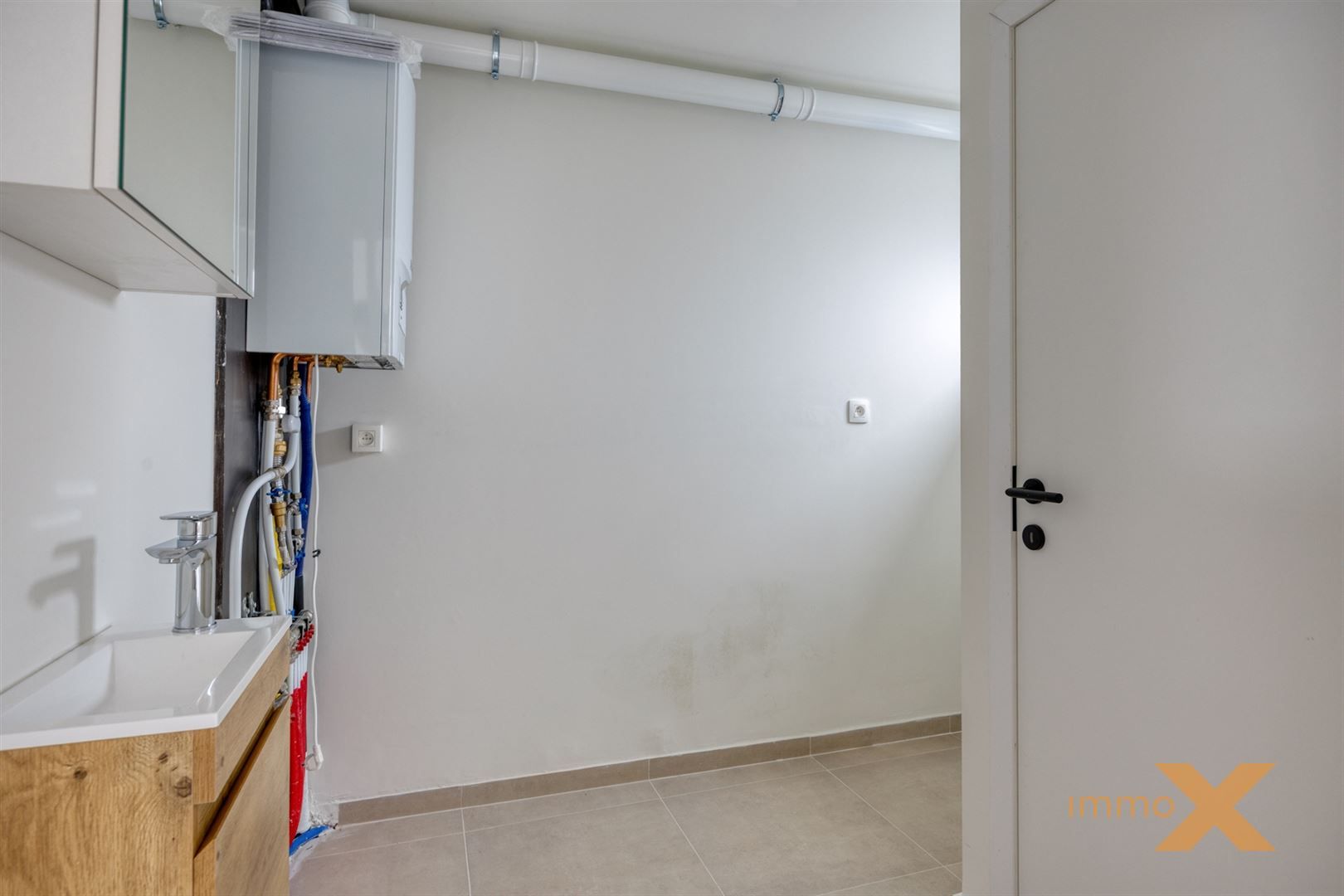 GERENOVEERDE KNUSSE WONING MET LEUKE TUIN foto 9