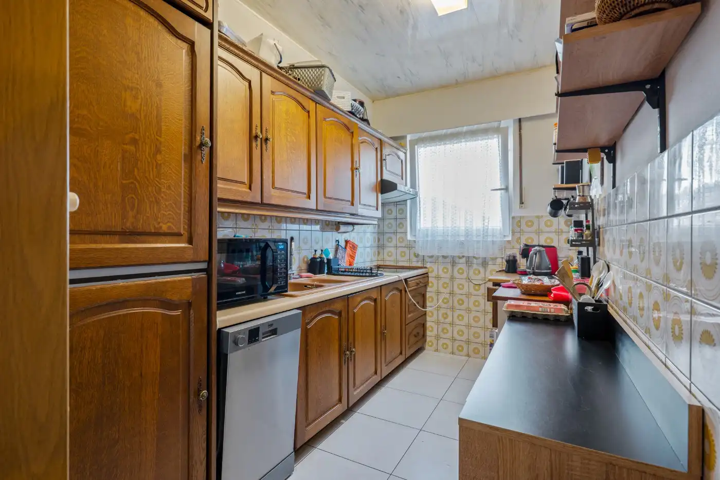 Gelijkvloers appartement met 2 slpk., veranda, verhard tuintje en garage foto 6