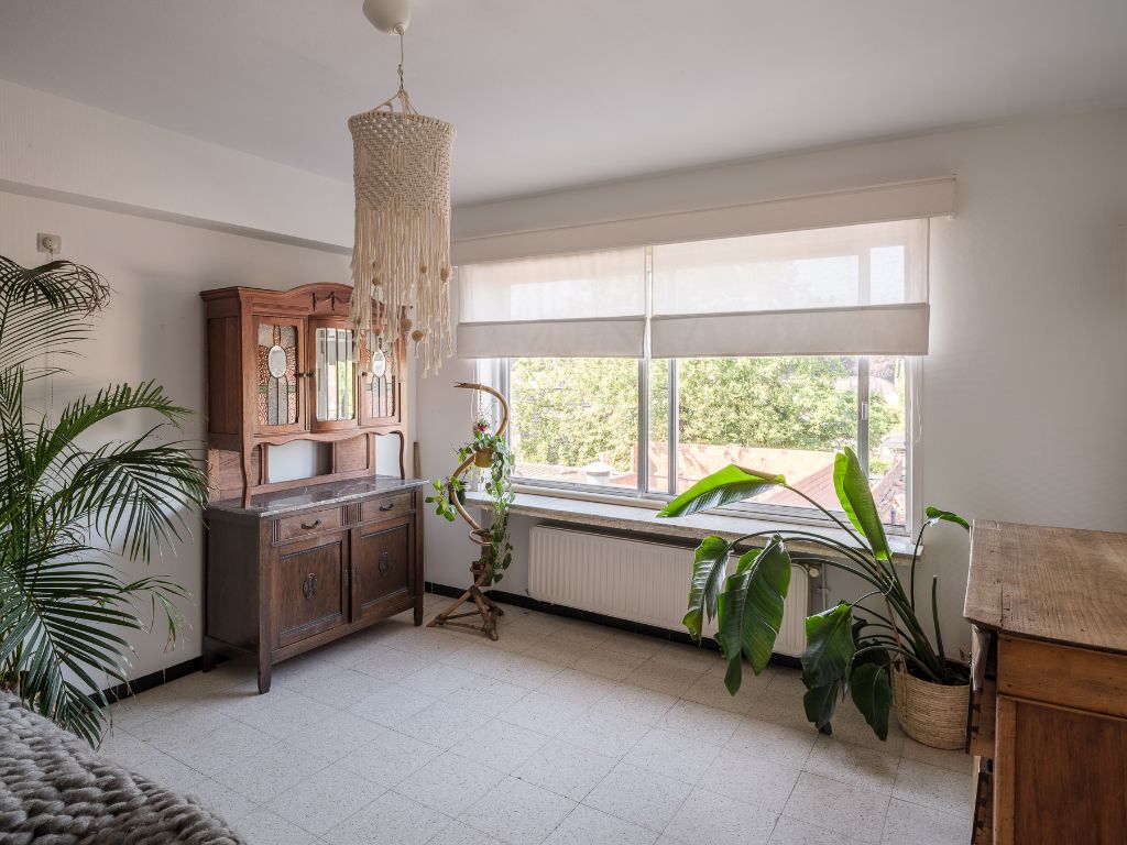 Lichtrijk en ruim 2 slpk appartement op fietsafstand van Gent centrum en wandelafstand van het natuurpark Bourgoyen-Ossemeersen. Een echte opportuniteit door zijn ligging, prijs en potentieel! foto 11