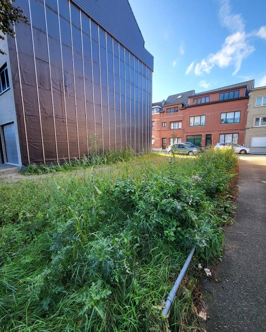 Bouwgrond voor meergezinswoning - inclusief 17 garageboxen. foto 2