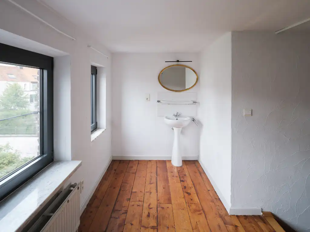 Instapklare stadswoning met drie slaapkamers en aangename tuin nabij Gent-Sint-Pieters. foto 17