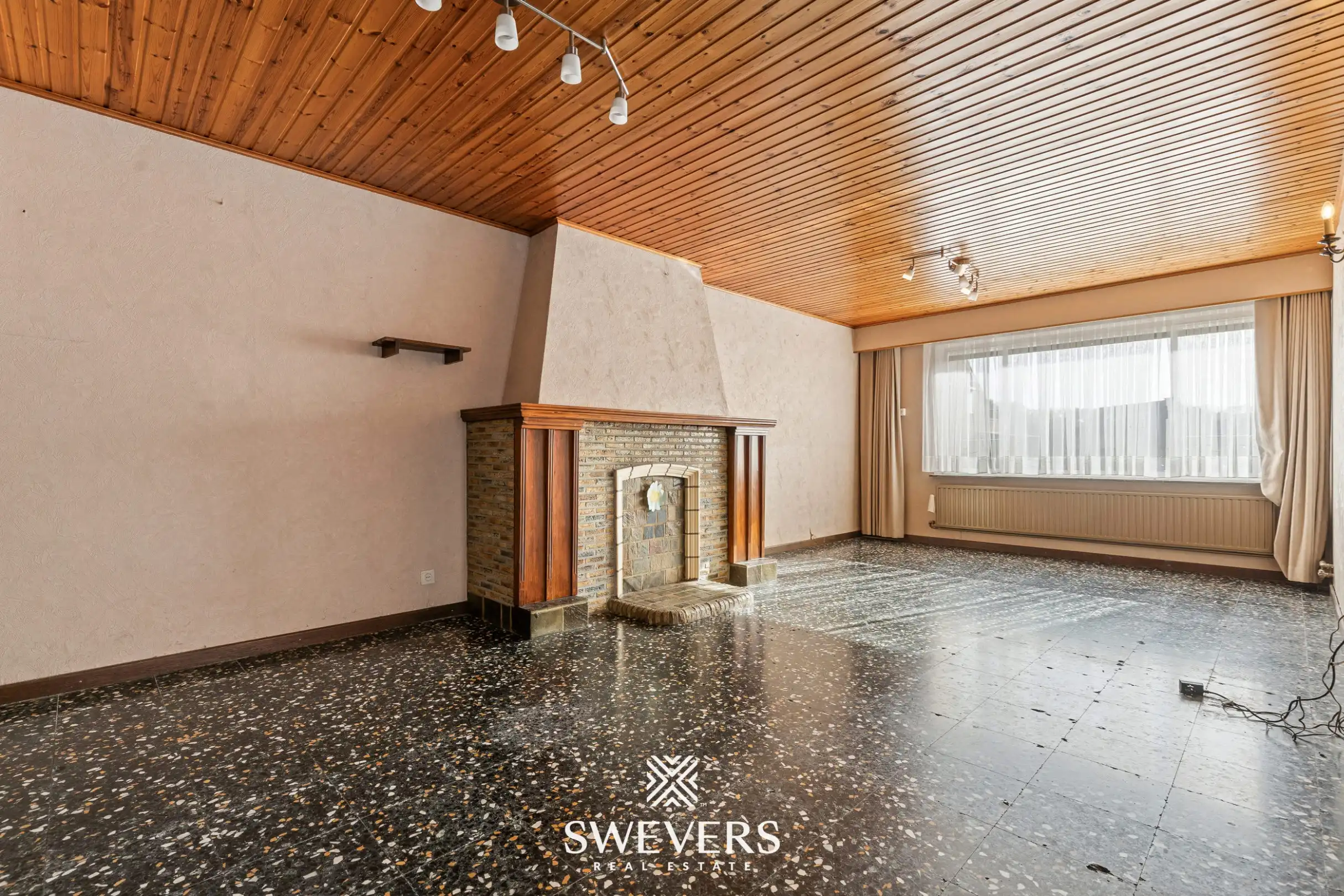 Ruime te renoveren woning op zonnig (ZW) perceel van 12a 33ca in het centrale Lummen foto 2