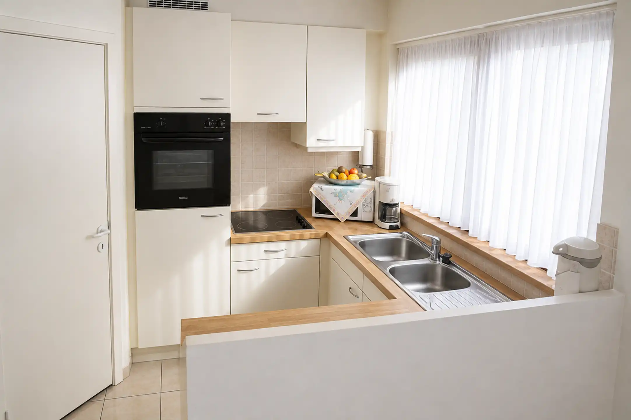 Duplex appartement met terras, 2 slaapkamers en parking foto 3