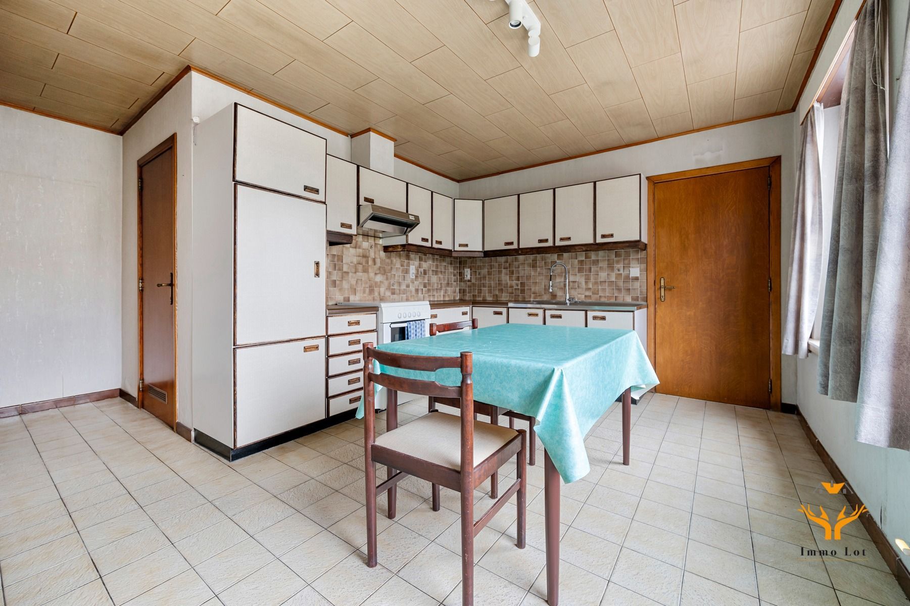 Te renoveren woning met tuin in rustige buurt foto 3