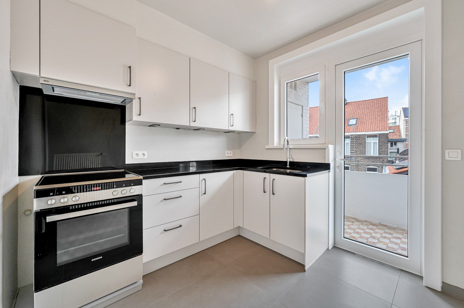 Modern 2 slpk appartement met terras en garage foto {{pictureIndex}}