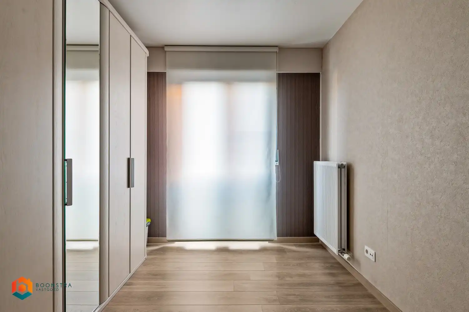 Instapklaar gelijkvloers appartement met 2slpkrs en tuin foto 12