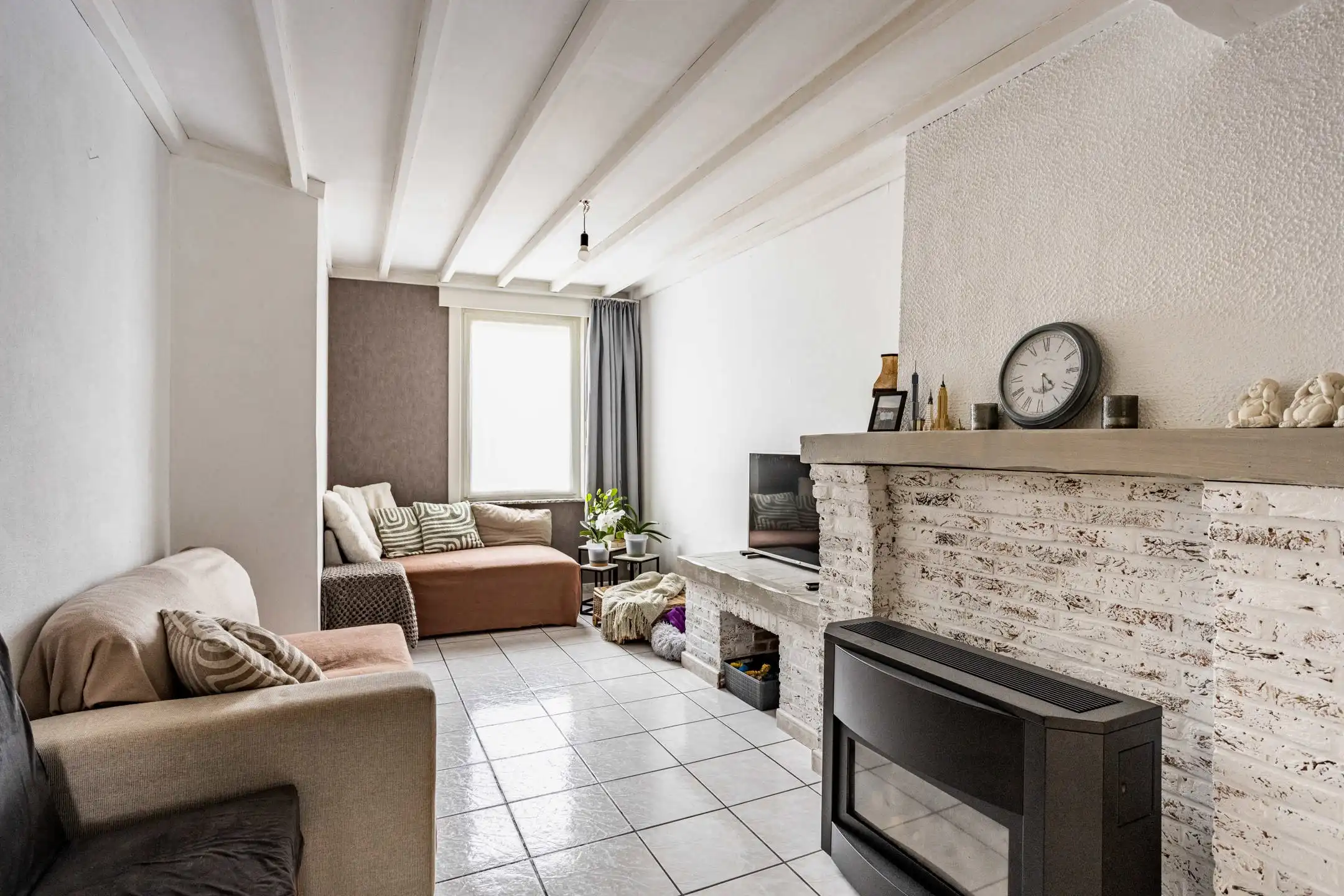 Knusse, instapklare woning met tuin net buiten het centrum! foto 4