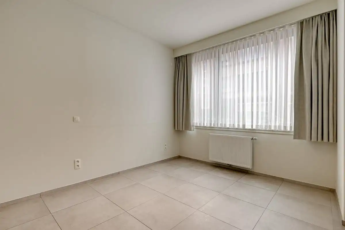 Assistentiewoning met 2 slaapkamers te koop in centrum Kortrijk! foto 7