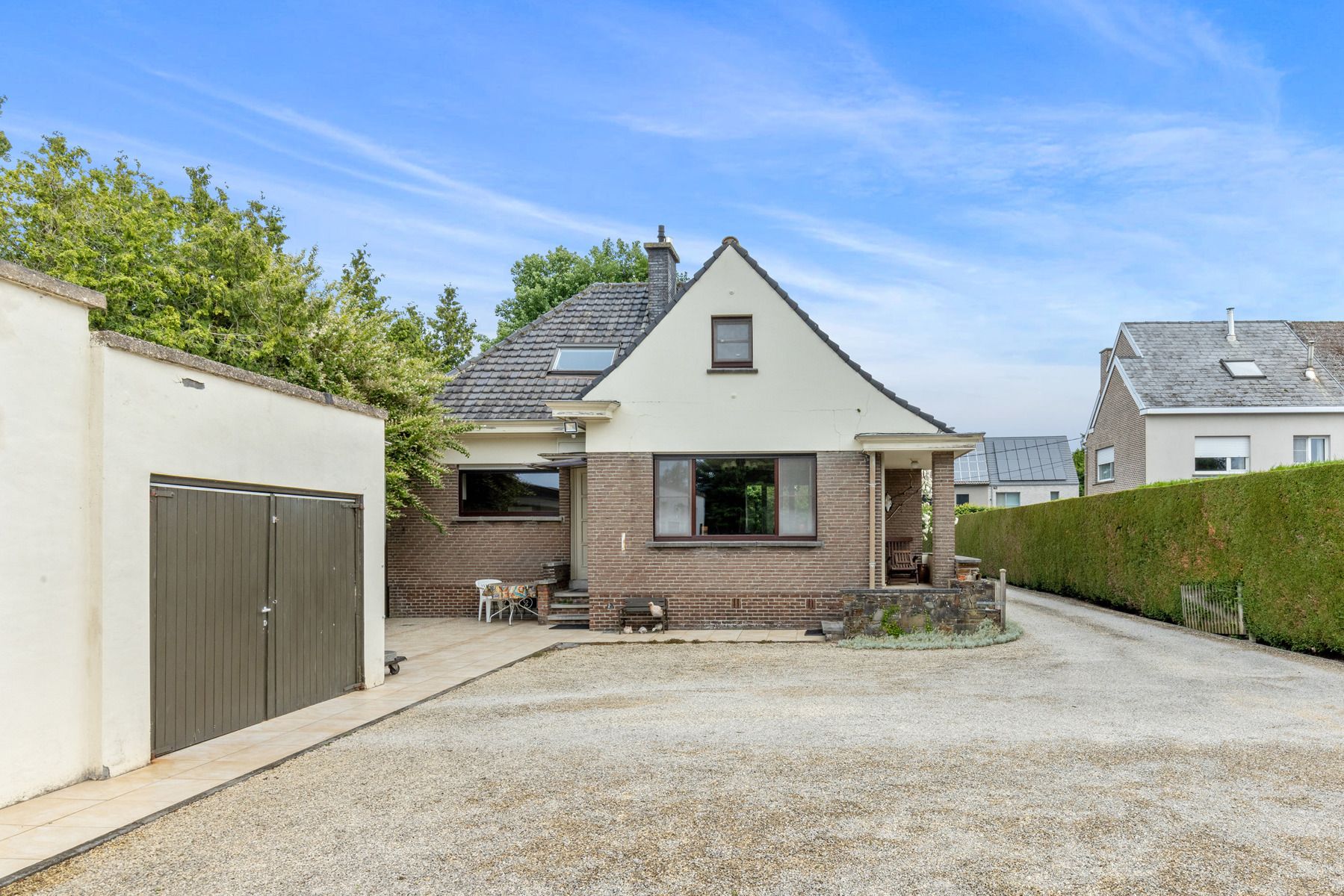 Ruime woning met prachtige tuin in het mooie Schellebelle! foto 4