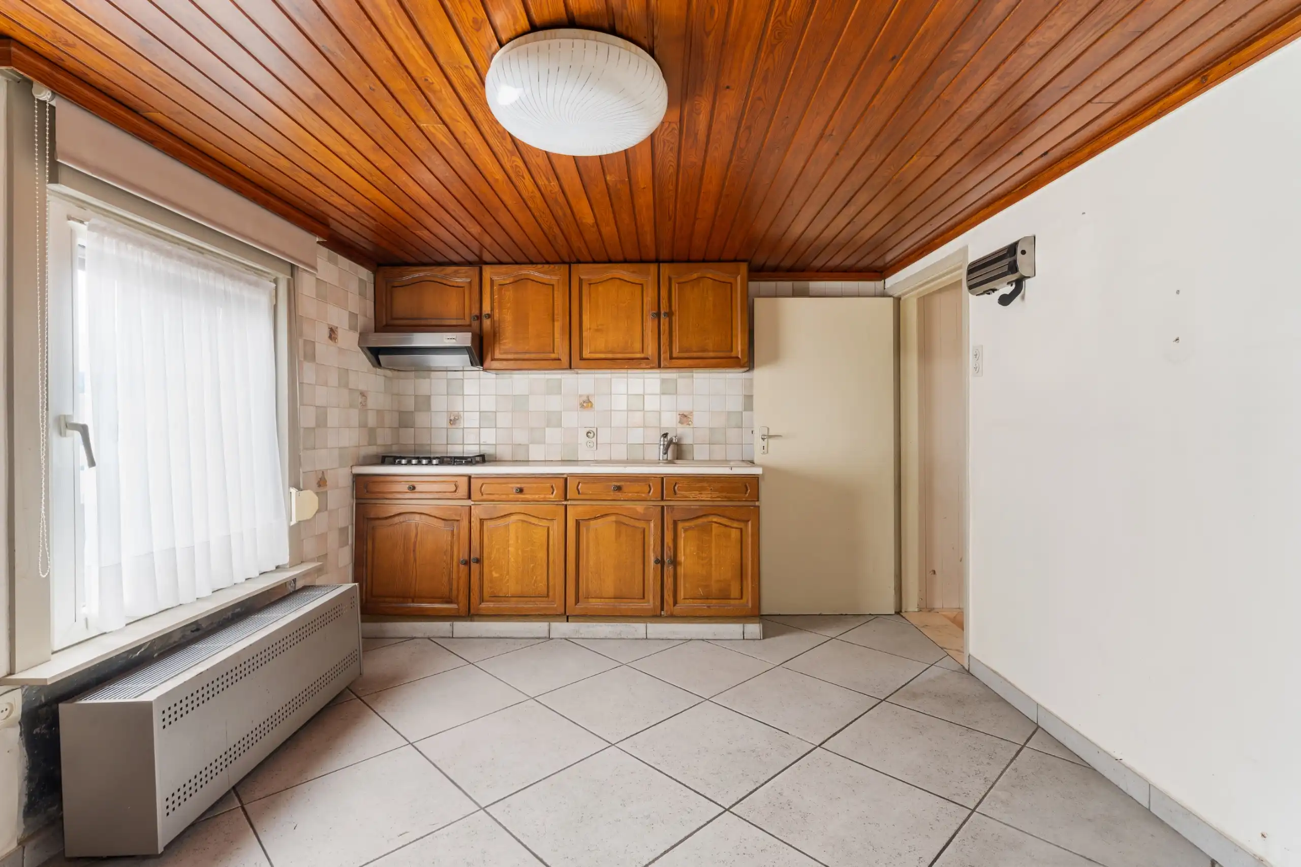 Voormalig te renoveren handelspand met woonst foto 13