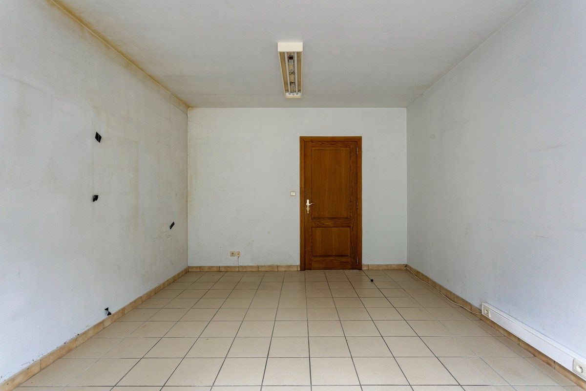 Grote woning in Tongeren centrum met ruimte voor burelen of praktijk foto 10