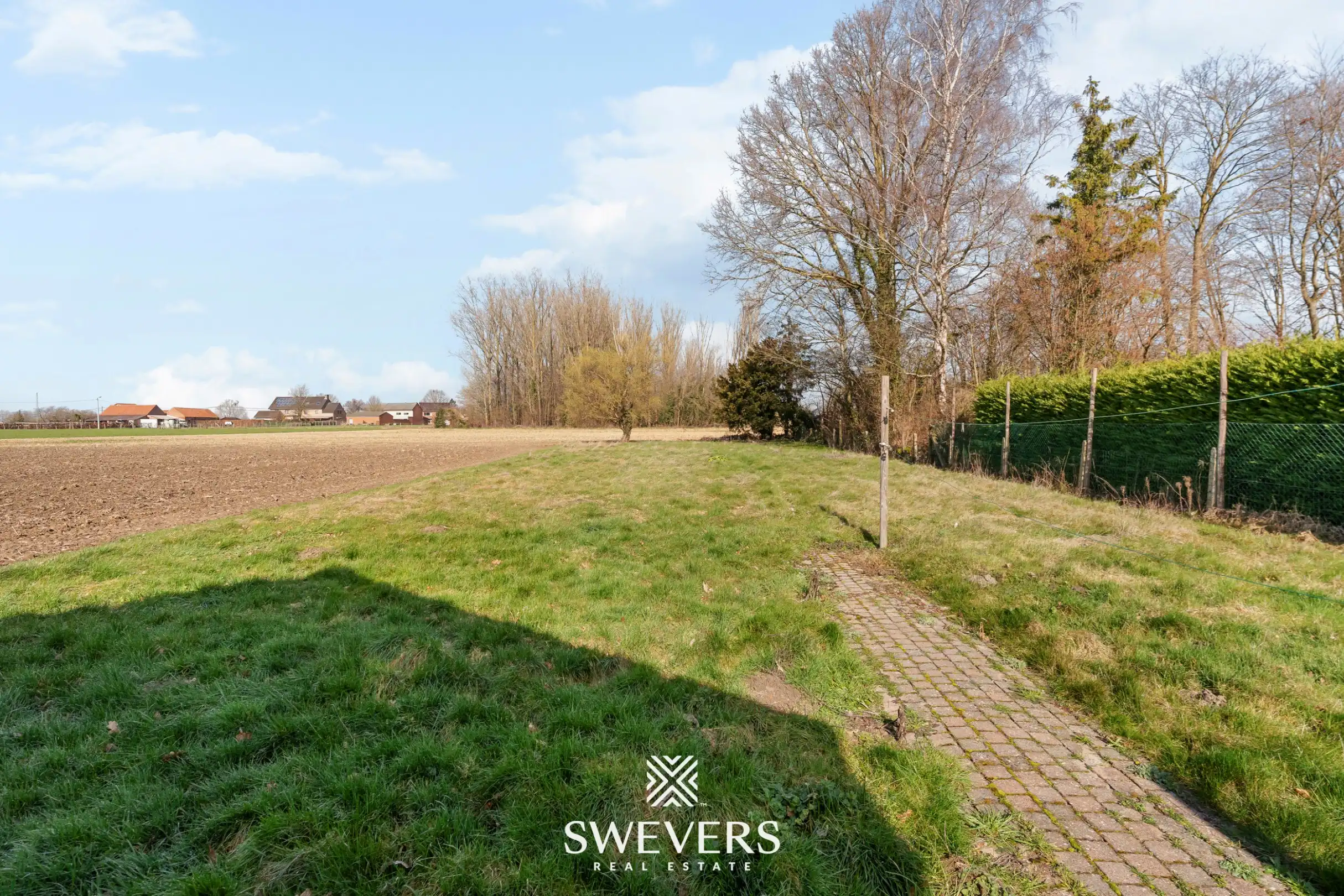 Te renoveren woning met 4 slaapkamers, grote tuin en omliggende velden op rustige ligging nabij centrum Diepenbeek foto 37