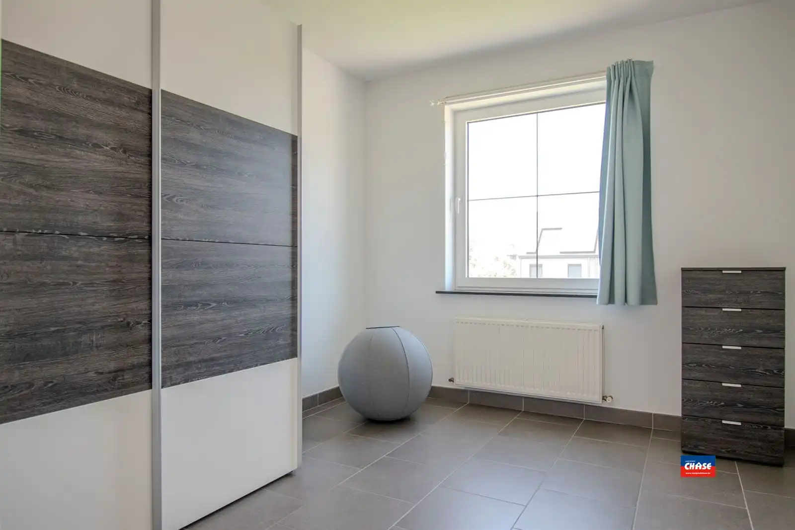 Instapklare woning met 4 slaapkamers, tuin en garagebox foto 21